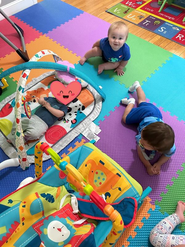 Babies playing on the foam play mats
