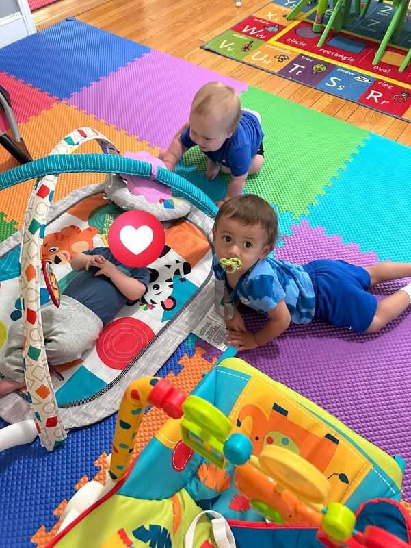 Babies playing on the colorful foam mats